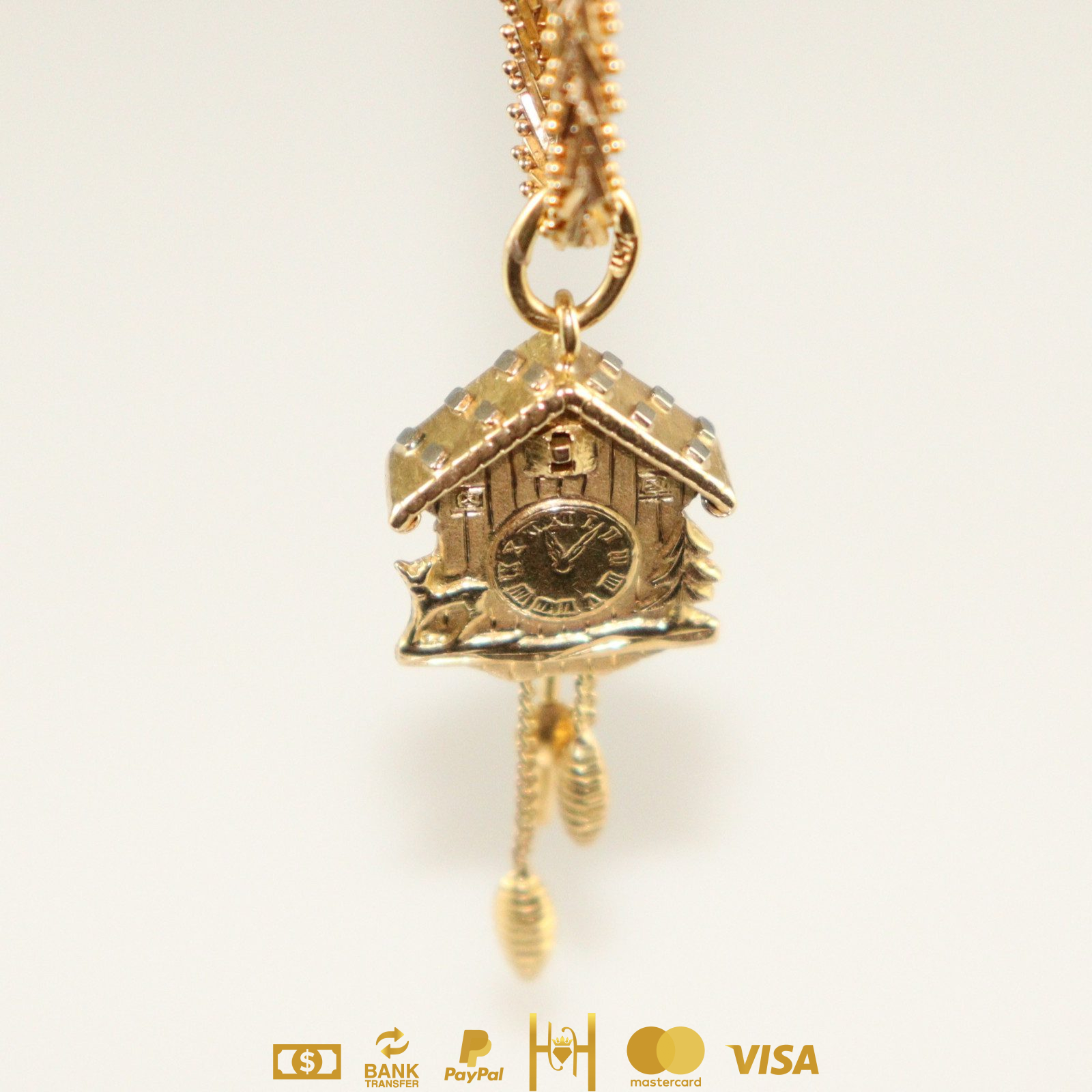 Dije Reloj Cuckoo 18k