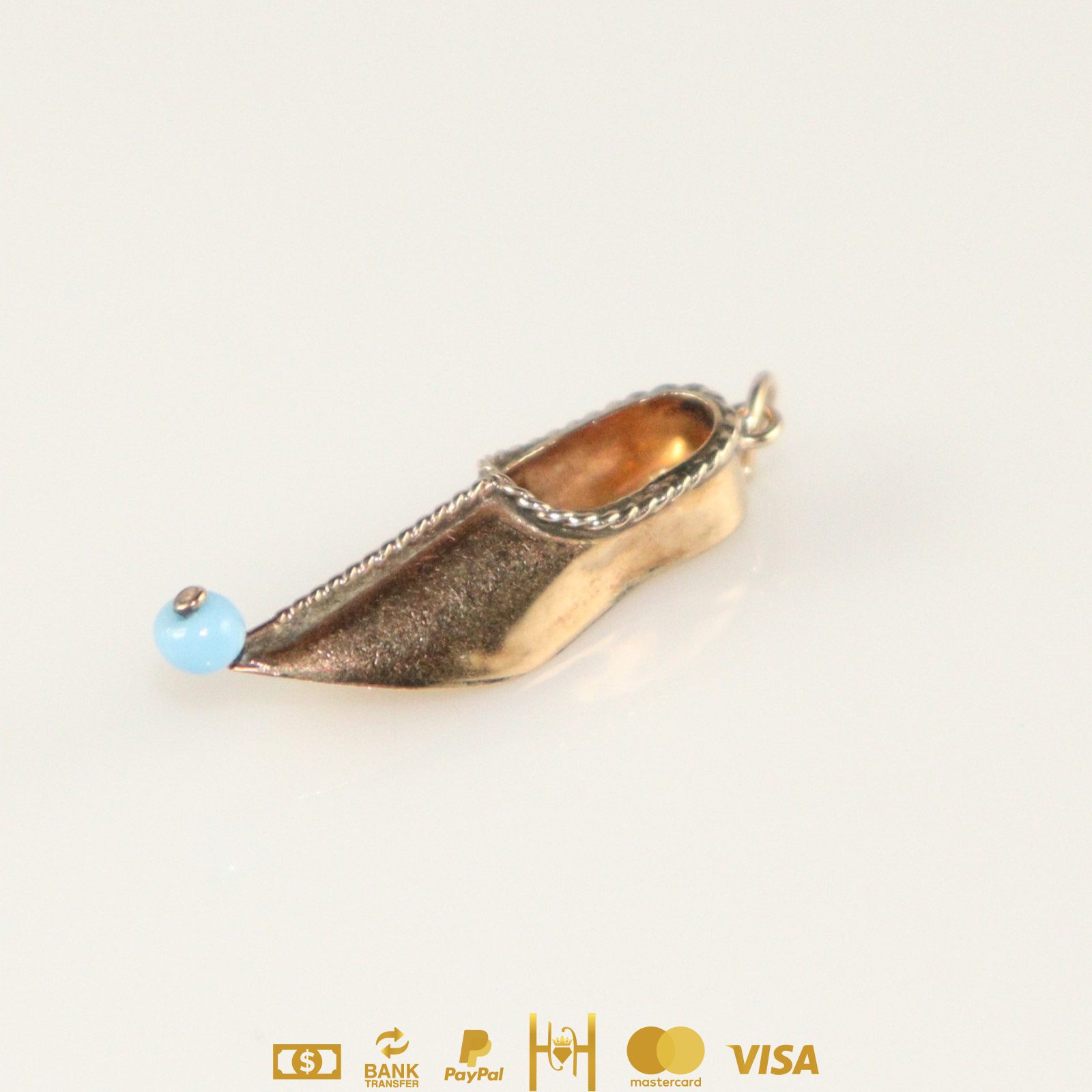 Dije de zapatilla exótica 14k